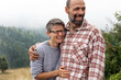 © Jovana Milanko/Stocksy - Happy Hugged Married Couple Portrait