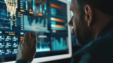 Poster - Businessman Analyzing Data on a Large Computer Monitor
