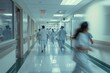 © Victor Bertrand - Medical staff in blue scrubs race down a hospital corridor, showcasing urgency, teamwork, and dedication in a high-pressure environment.