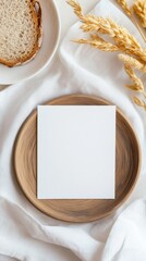 Poster - Minimalist Theme Mockup Empty White Card Surrounded by Bread Slice and Silver Chain on Soft White Fabric