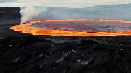 Aufkleber - Witness the awe inspiring sight of molten lava erupting from a volcano. Creating a fiery lake surrounded by billowing smoke and ash