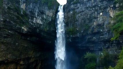Poster - Powerful waterfall cascading down a steep cliff, surrounded by rugged rocks and lush greenery in a mesmerizing fantasy setting