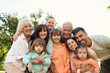 © Iuliia Versta/Stocksy - Portrait of a family of several generations in the garden