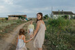 © Anna Artemenko/Stocksy - Family on a walk outside the city