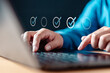 © Garun Studios - mark, choose, checklist, check, checkmark, password, checkbox, survey, complete, tick. A person is typing on a laptop with a check mark on the screen, using a keyboard and the laptop is on a table.