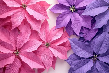 Artistic holiday decoration with abstract pink and purple poinsettias.