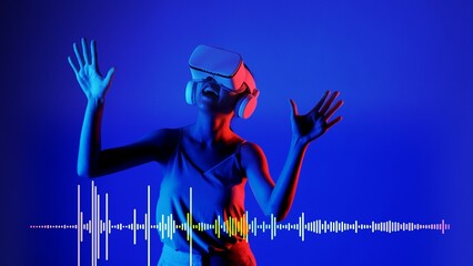 Smiling woman listening and dancing fun song using VR headset with graphic equalizers electronic modern design at studio dynamic lighting music and technology concept blue background. Hallucination.