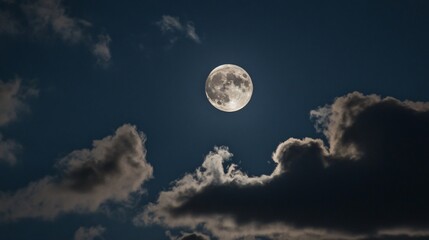 bright moon shining through a partly cloudy night sky, clear weather, tranquil evening