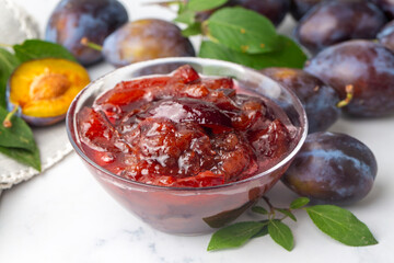 Wall Mural - Damson plum jam and fresh plums