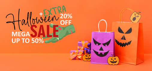 Canvas Print - Composition with shopping bags and gift boxes for Halloween on purple background