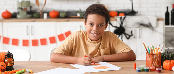 Poster - Teenage African-American boy drawing Halloween picture at home