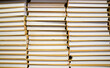 © Hernandez & Sorokina/Stocksy - Close up view of stacked books