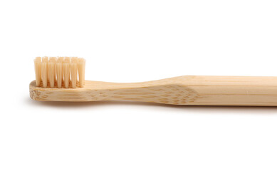 Wall Mural - Bamboo tooth brush on white background, closeup