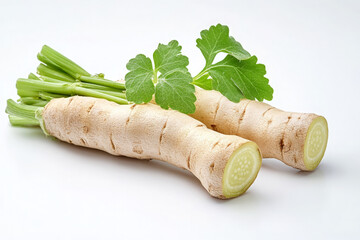 Two whole parsnips with green leafy stems and one sliced parsnip, isolated on a white background.