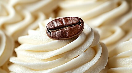 Wall Mural -   A zoomed-in picture of a cupcake adorned with frosting and a coffee bean on top