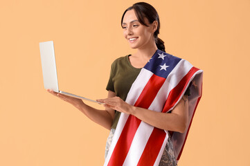 Poster - Female soldier with USA flag and laptop on beige background. Veterans Day celebration