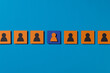 © Marc Tran/Stocksy - Leadership Concept With Unique Highlighted Icon In Row