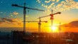© Polar Son - A construction site at dawn with cranes silhouetted.