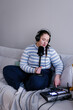 © Oleksii Syrotkin/Stocksy - Plus size podcaster making sound adjustments for live broadcasting