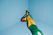 © Ulas&Merve/Stocksy - Abstract Fashion Photo With Colorful Legs and Geometric Bag