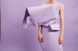 © Ulas&Merve/Stocksy - Abstract Fashion Model In Purple Origami Paper Dress