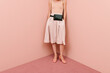 © Ulas&Merve/Stocksy - Fashion Model Wearing Trendy Outfit Against Pink Background