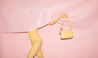 © Ulas&Merve/Stocksy - Creative Fashion Concept With Pink Background And Yellow Outfit