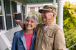 © Raymond Forbes LLC/Stocksy - Senior Veteran selfie  Portrait smartphone porch with wife