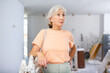 © JackF - Portrait of disgruntled elderly woman homeowner feeling stressed of renovation process in house