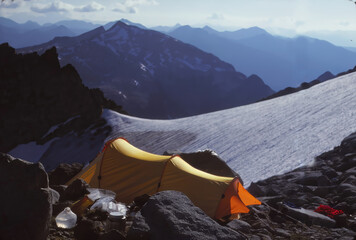 mountain camp with yellow tent
