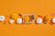 © Marc Tran/Stocksy - Spooky shopping cart with Halloween decorations on orange
