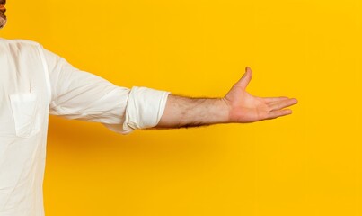 Arm and hand of caucasian man over yellow isolated background snapping fingers for success, easy and click symbol gesture with hand. 