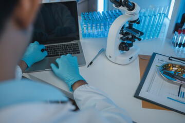 Wall Mural - working atmosphere in the laboratory, chemistry and science specialist working in a lab with various