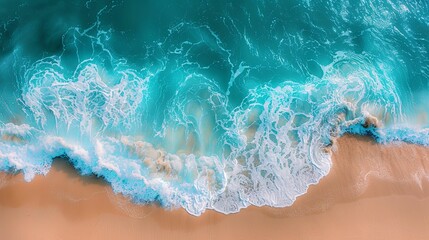 Aerial View of Turquoise Ocean Waves Breaking on Sandy Beach