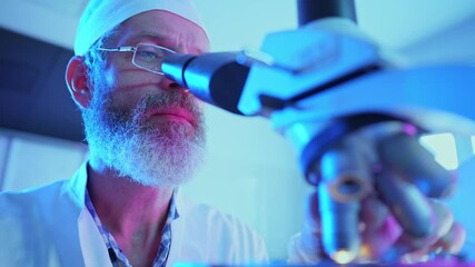 Wall Mural - innovative chemist analyzes samples with advanced microscopy in research laboratory