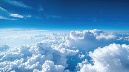 Wall Mural - Scenic view white clouds in blue sky from above