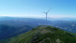 © ORANGE - Mountaintop wind turbines generate low-carbon, renewable energy.
