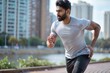 © N7 - Athletic Indian Runner in Park: Solo Cardio Workout for Wellness and Health