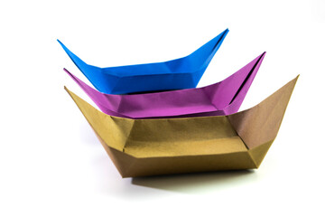 Paper colored boat isolated on white background. origami crafts. transport concept. origami.