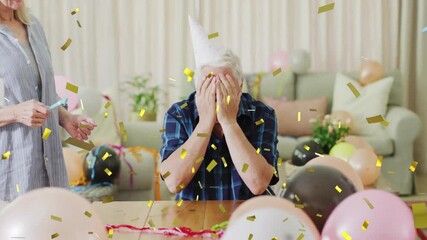 Poster - Celebration animation over elderly man covering face with hands, surrounded by balloons