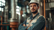 © Hima Studio - Portrait of Industry maintenance engineer man wearing uniform and safety hard hat on factory station. Industry, Engineer, construction concept