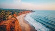 © P.G - Top view of Varkala Beach in Kerala, with its red cliffs and coconut palms overlooking the Arabian Sea. No people.