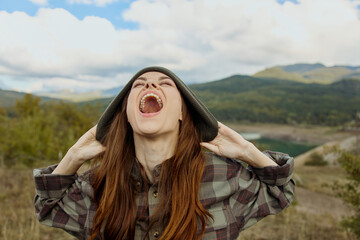 Woman amazed by stunning mountain lake view, breathless beauty of nature on travel adventure