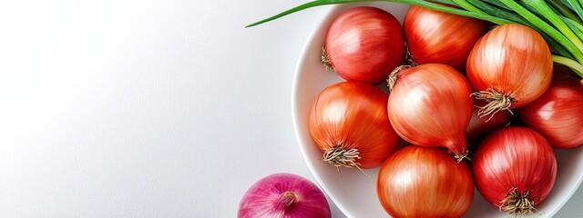 Wall Mural -  A white bowl full of red onions One green onion atop the counter, nearby