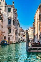 Wall Mural - A stunning and beautiful view of a picturesque Venice canal, showcasing vibrant architecture and tranquil waters