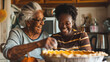 © Kanlayarawit - Happy old and young black woman are making a pumpkin pie in a kitchen. Background for of the Thanksgiving seasonal or bakery and pastry business.