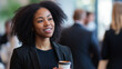 © Pixel Pioneer - A picture of a black woman networking on a Business Conference while enjoying a cup of coffee