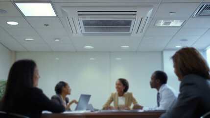 Poster - Efficient air conditioning enhances comfort in modern office meeting.