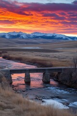 Wall Mural - Fiery sunset mountain landscape with flowing river