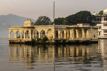 artistic palace architecture at pristine lake at morning